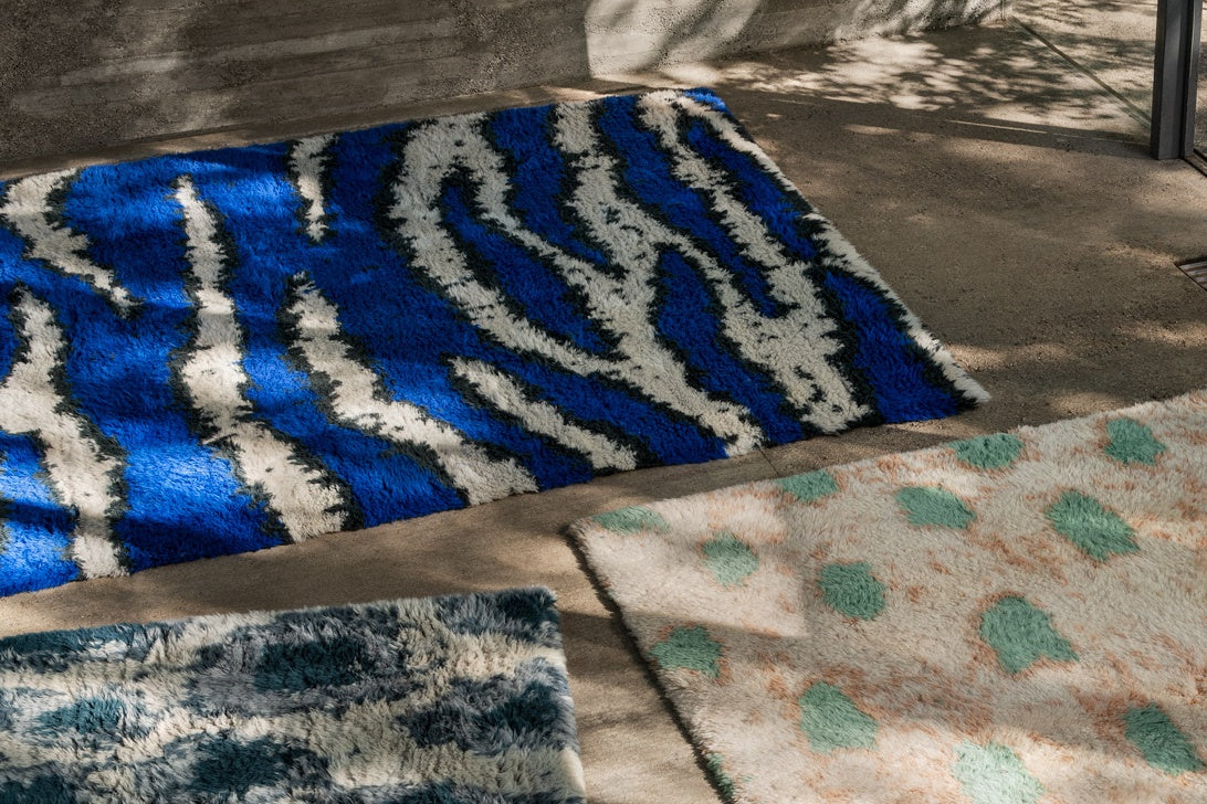 An image of 3 Monster Rugs in Ultramarine / Off-White, Dark Teal / Off-White, and Turquoise / Peach.
