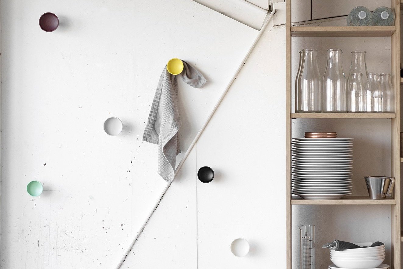 A lifestyle image of a kitchen scene featuring Punched Metal Hooks on the wall.